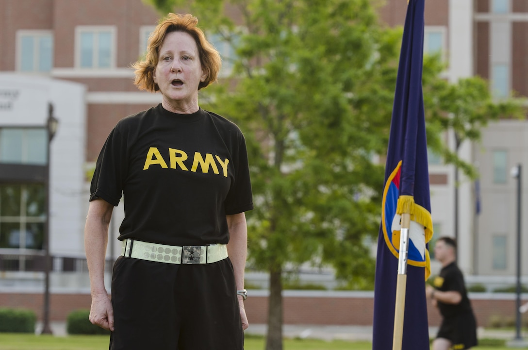 Maj. Gen. Megan P. Tatu, U.S. Army Reserve Command chief of staff, sings the Army Song with the formation after a staff run at Fort Bragg, N.C., April 21, 2017, to celebrate the 109th birthday of the Army Reserve. Created April 23, 1908 as the Medical Reserve Corps, America's Army Reserve of today has transformed into a capable, combat-ready, and lethal Federal reserve force in support of the Army at home and abroad. (U.S. Army Reserve photo by Stephanie Ramirez/Released)