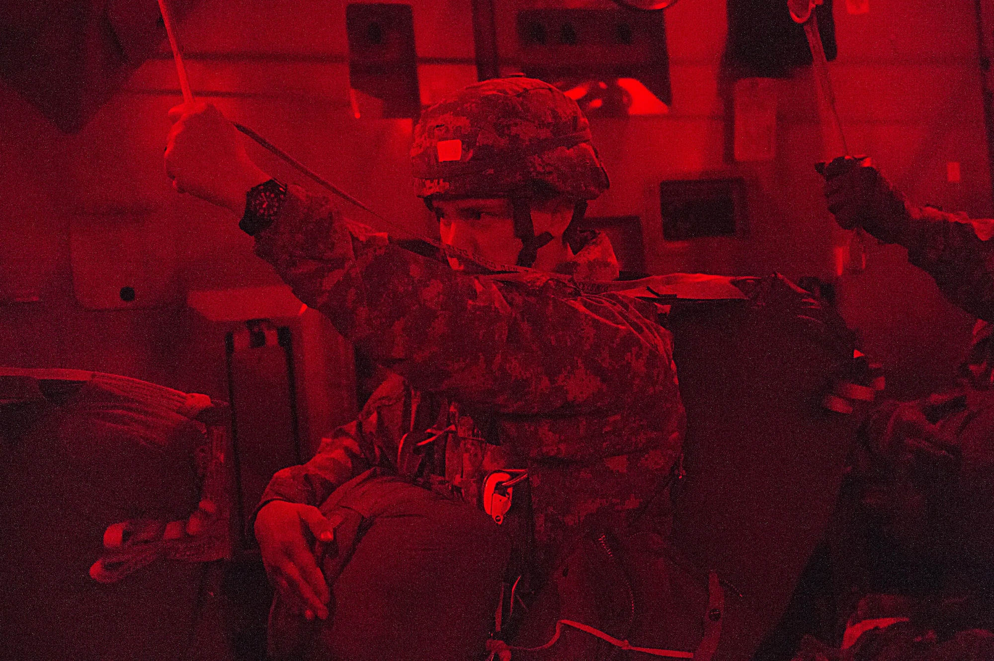 Paratroopers with the 4th Infantry Brigade Combat Team (Airborne), 25th Infantry Division, U.S. Army Alaska, jump from a C-17 Globemaster III during a night jump at the Malemute Drop Zone at Joint Base Elmendorf-Richardson, Alaska, April 18, 2017. Routine jump training is conducted to maintain proficiency and train for prospective missions. 