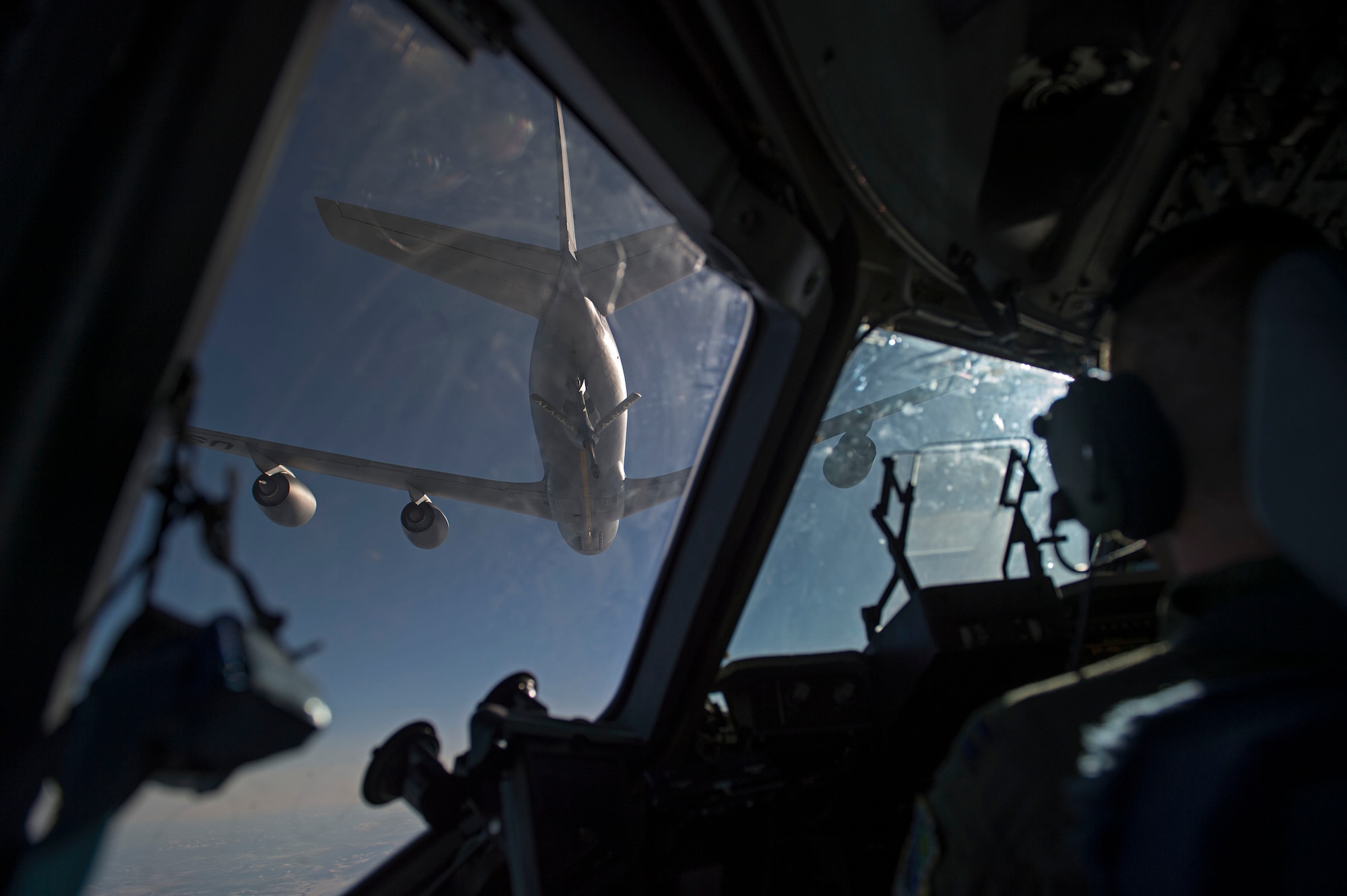 C-17 Globemaster III pilots with the 517th Airlift Squadron, prepare to lock onto the boom of a KC-135 Stratotanker from the 186th Air Refueling Squadron, during air refueling training, April 18, 2017. In total four pilots on the C-17 took turns linking up to the boom to practice air refueling readiness. 