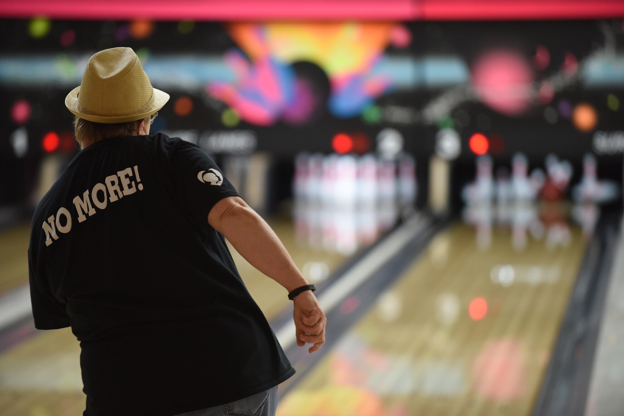 Ann McCarty, North County Rape Crisis and Child Protection Center executive director, rolls a bowling ball down the lane during a bowling event, April 21, 2017, Vandenberg Air Force Base, Calif. The event, hosted by the Sexual Assault Prevention and Response office, was designed to increase awareness and support during Sexual Assault Awareness and Prevention Month, which is nationally recognized in April. (U.S. Air Force photo by Senior Airman Robert J. Volio/Released)