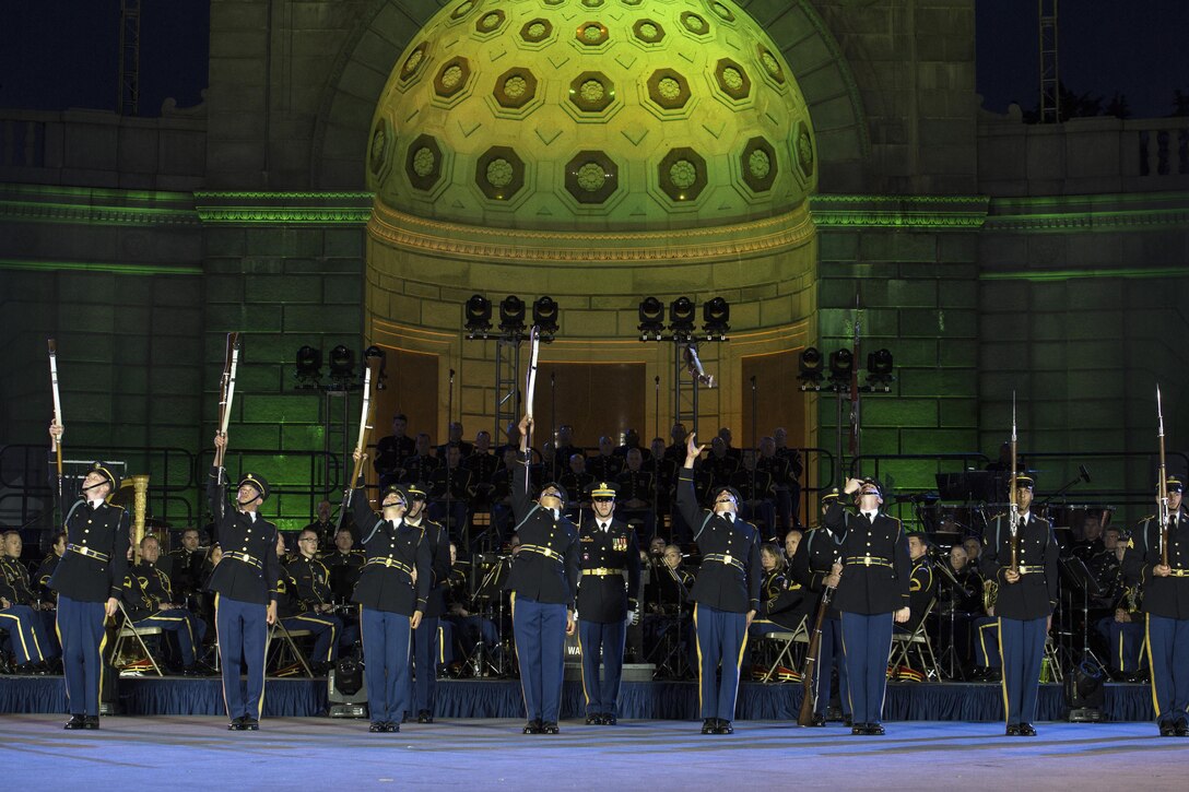 Members of the U.S. Army Drill Team perform during rehearsals for the concert “An Evening with Heroes and Voices” at Arlington National Cemetery in Virginia, April 19, 2017. Show performances were scheduled for 7:30 p.m. April 21-22. DoD photo by EJ Hersom