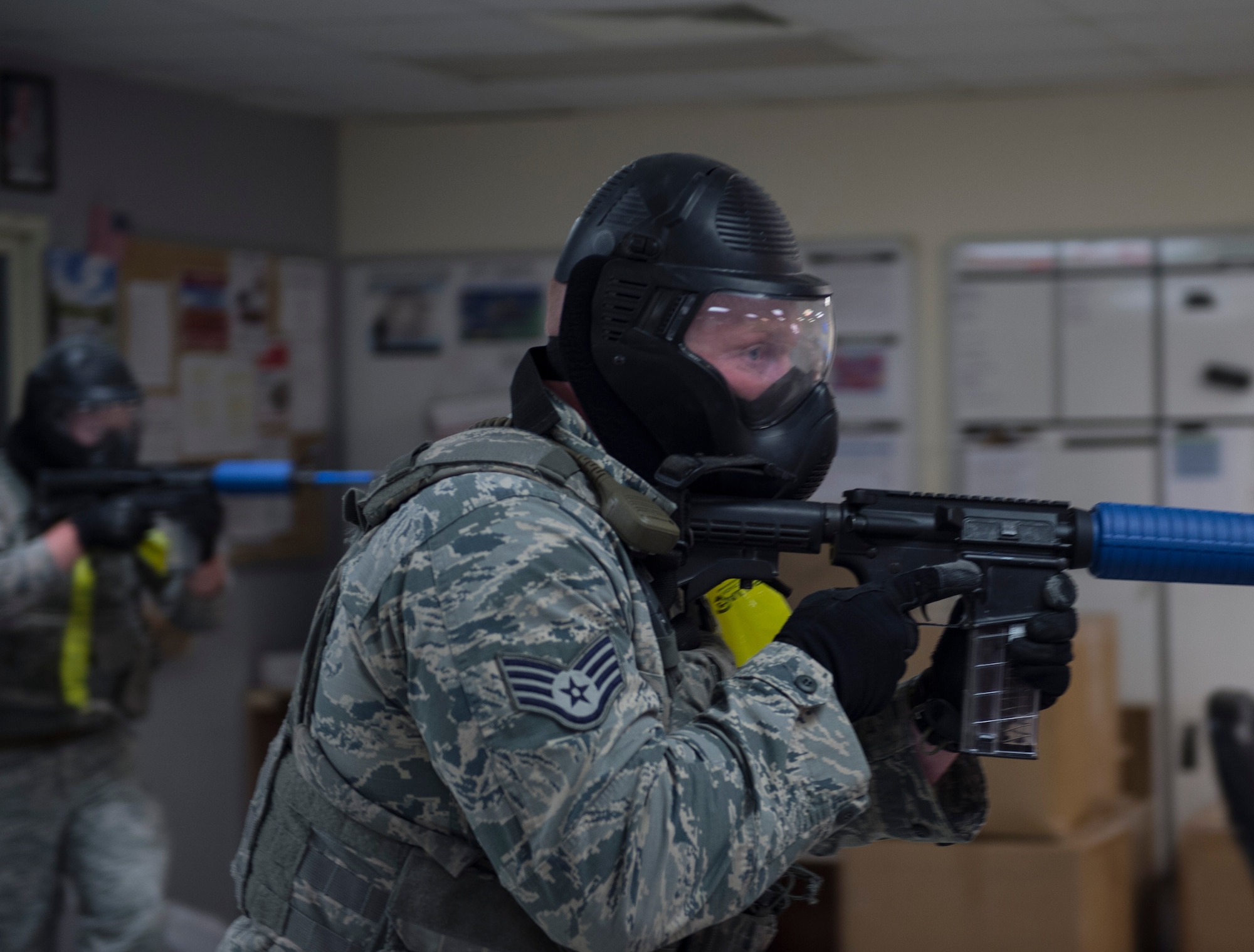 U.S. Air Force Airmen from the 379th Expeditionary Security Forces Squadron clear a room during an active shooter exercise at Al Udeid Air Base, Qatar, April 17, 2017. The active shooter exercise tested the skills and abilities of Airmen to work with other units in in order to gain a better understanding of each other’s roles in the event of a real-world situation.   (U.S. Air Force photo by Tech. Sgt. Amy M. Lovgren)