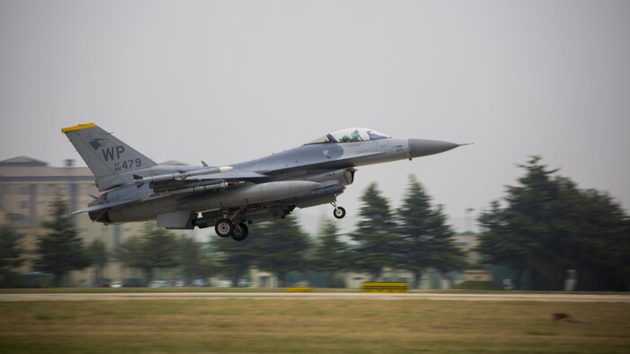 A U.S. Air Force F-16 Fighting Falcon lands on the runway after concluding a defensive counter air mission during Exercise MAX THUNDER 17 at Kunsan Air Base, Republic of Korea, April 18, 2017. Max Thunder serves as an opportunity for U.S. and ROK forces to train together and sharpen tactical skills for the defense of the Asia-Pacific region. It is an annual military-flying exercise built to promote interoperability between U.S. and ROK forces. (U.S. Marine Corps photo by Lance Cpl. Carlos Jimenez)