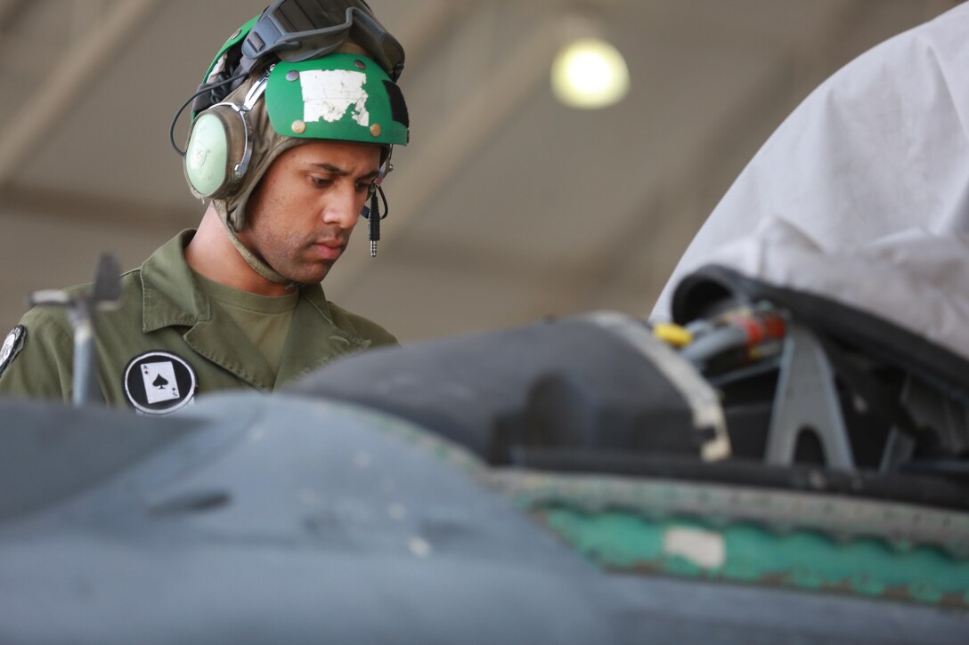 U.S. Marine Corps Sgt. Chase Baker, an airframes mechanic deployed in support of Combined Joint Task Force – Operation Inherent Resolve, assigned to Marine Attack Squadron 231, Special Purpose Marine Air-Ground Task Force-Crisis Response-Central Command, conducts a maintenance check of an AV-8B Harrier, Feb. 27, 2017. SPMAGTF-CR-CC continues its commitment to support OIR and USCENTCOM through employment of kinetic air strike missions, security cooperation and crisis response assets within the region. CJTF-OIR is the global Coalition to defeat ISIS in Iraq and Syria. (U.S. Marine Corps photo by Staff Sgt. Jennifer B. Poole)