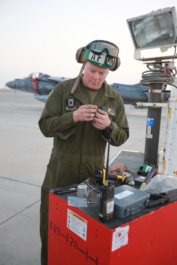 U.S. Marine Corps Lance Cpl. Kyle McGroarty, an airframes mechanic deployed in support of Combined Joint Task Force – Operation Inherent Resolve, assigned to Marine Attack Squadron 231, Special Purpose Marine Air-Ground Task Force-Crisis Response-Central Command, conducts a pre-flight check on an AV-8B Harrier, March 2, 2017. SPMAGTF-CR-CC continues its commitment to support OIR and USCENTCOM through employment of kinetic air strike missions, security cooperation and crisis response assets within the region. CJTF-OIR is the global Coalition to defeat ISIS in Iraq and Syria. (U.S. Marine Corps photo by   Staff Sgt. Jennifer B. Poole)