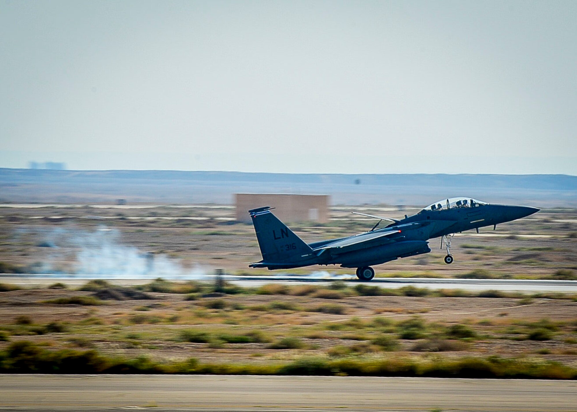 An F-15E Strike Eagle lands at an undisclosed location in Southwest Asia, April 7, 2017. The jet is deployed from the 492nd Fighter Squadron at RAF Lakenheath, England. The 492nd Expeditionary Fighter Squadron has taken over for the 389th EFS that was deployed to the 332nd Air Expeditionary Wing for the last six months. (U.S. Air Force photo by Tech Sgt. Eboni Reams)