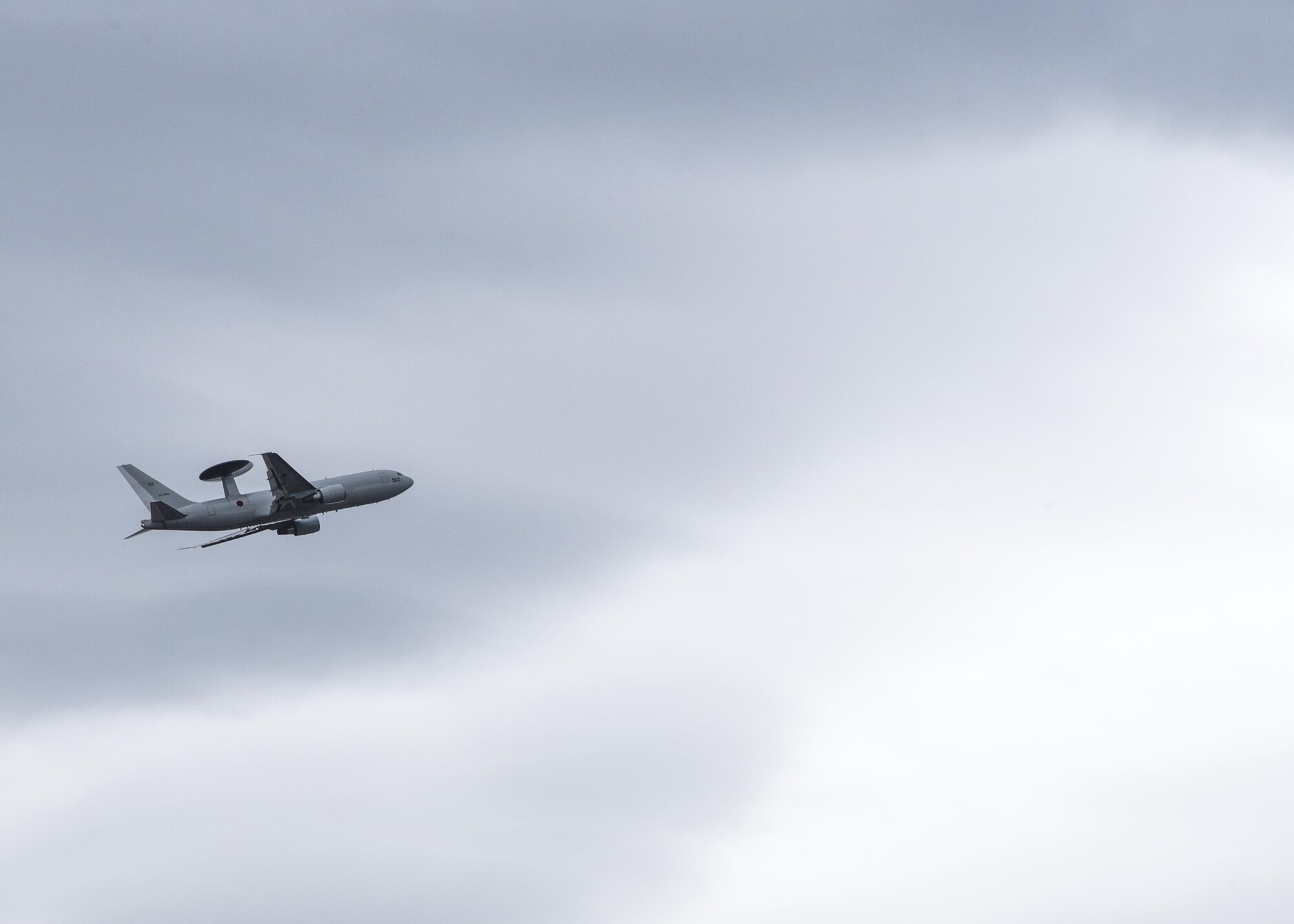 A Japan Air Self-Defense Force E-757, an airborne early warning and control aircraft, soars over Misawa Air Base, Japan, April 19, 2017. The E-757 was one of 18 aircraft that participated in a bi-annual bilateral training exercise, part of a continuous exercise program to enhance interoperability between U.S. and Japan forces. (U.S. Air Force photo by Staff Sgt. Melanie A. Hutto) 