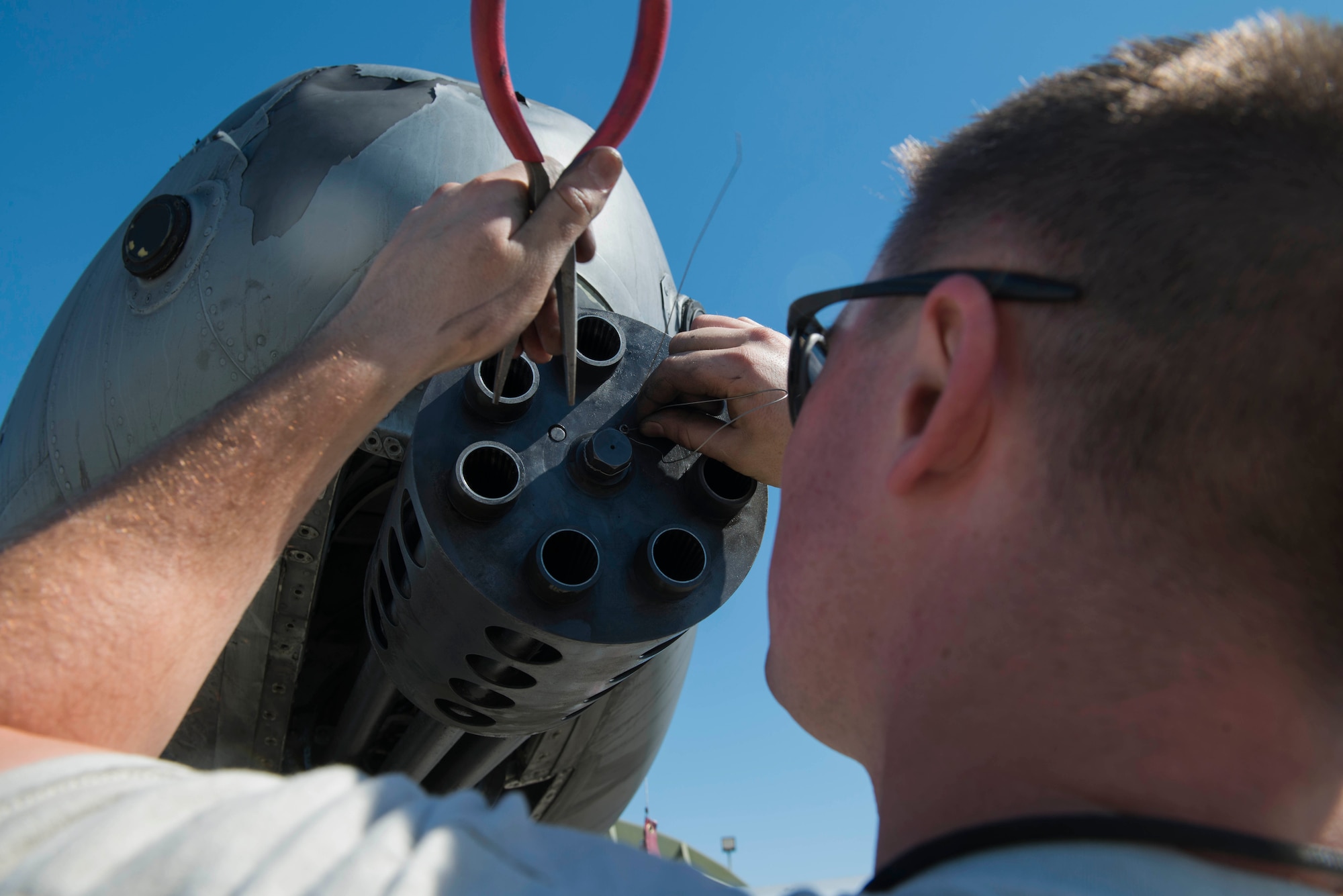 U.S. Air Force Senior Airman Nathaniel Awrey, 447th Expeditionary Aircraft Maintenance Squadron aircraft armament systems journeyman, reassembles an A-10 Thunderbolt II GAU-8/A Avenger rotary cannon April 5, 2017, at Incirlik Air Base, Turkey. The seven barrels are inspected and replaced after 30 thousand rounds are fired through them. (U.S. Air Force photo by Airman 1st Class Devin M. Rumbaugh)