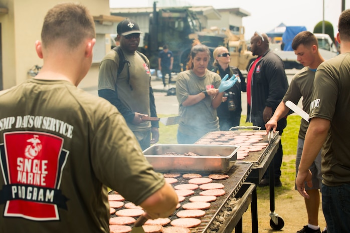 Volunteers attend a barbeque picnic to celebrate their hard work and volunteer service after the 3rd Annual Single Marine Program’s Days of Service Clean-Up Day at Marine Corps Air Station Iwakuni, Japan, April 21, 2017. Each day of the week volunteer service members spent time supporting the community by visiting a local Iwakuni nursing home, cutting and sorting coupons, teaching and playing chess with local Japanese students, and cleaning and walking dogs at the base kennel.  Clean-up day was the finale dedicated to bringing all the volunteers together to recognize and celebrate their contribution to the community.  (U.S. Marine Corps photo by Pfc. Stephen Campbell)