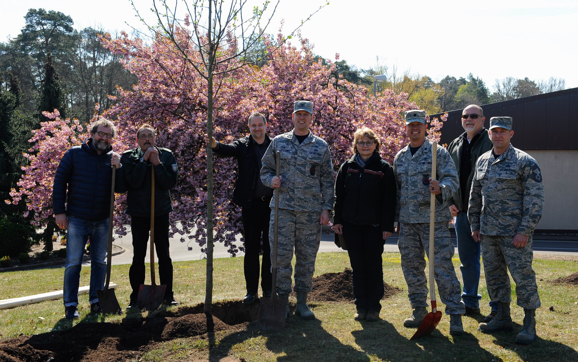 The 86th Civil Engineer Group leadership and federal forest departments participate in a tree planting ceremony on Ramstein Air Base, Germany, April 21, 2017. The tree planting ceremony was held to celebrate Earth Day and raise awareness for environmental protection. (U.S. Air Force photo by Airman 1st Class Savannah L. Waters)