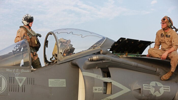 U.S. Marine Corps Lance Cpl. Tyler Summ, 22, Antigo, Wisconsin, a fixed wing aircraft mechanic deployed in support of Combined Joint Task Force – Operation Inherent Resolve, assigned to Marine Attack Squadron 231, Special Purpose Marine Air-Ground Task Force-Crisis Response-Central Command, speaks with an AV-8B Harrier pilot after returning from a flight, March 2, 2017. SPMAGTF-CR-CC continues its commitment to support OIR and USCENTCOM through employment of kinetic air strike missions, security cooperation and crisis response assets within the region. CJTF-OIR is the global Coalition to defeat ISIS in Iraq and Syria. 