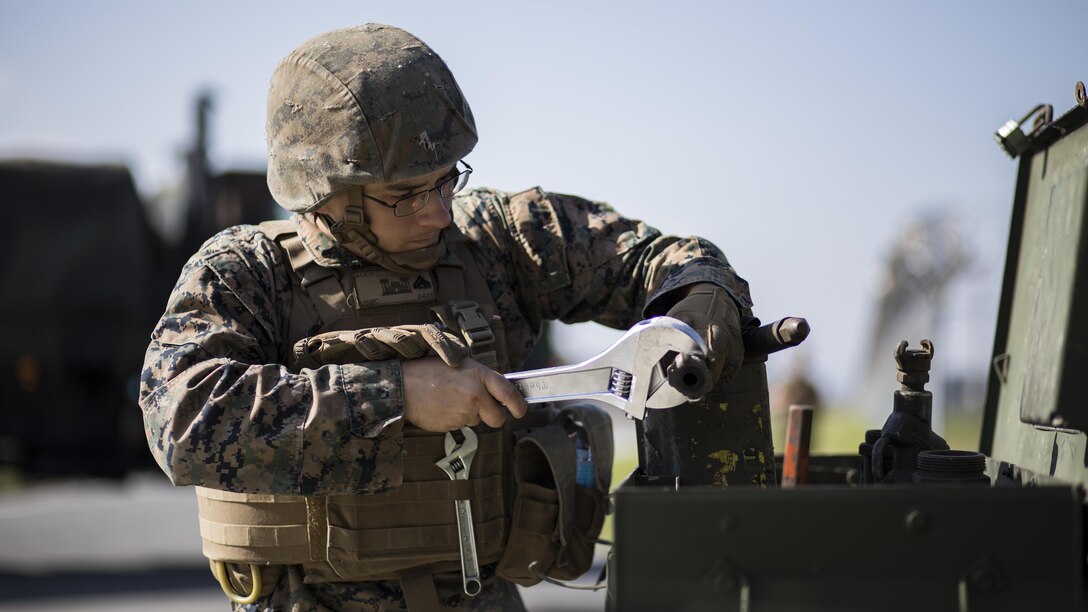 U.S. Marine Corps Cpl. Jeffrey Aceti, a combat engineer with Marine Wing Support Squadron 171, maintains equipment used during airfield damage and repair training at Marine Corps Air Station Iwakuni, Japan, April 19, 2017. The ADR training required Marines to utilize their skill set to tactically and proficiently fix any anomalies to a simulated damaged airfield. The training focused on becoming more efficient in situations that may require Marines to act in real-world scenarios to maintain the tempo of aircraft operations.