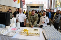 Maj. Gen. Troy D. Kok, commanding general for the U.S. Army Reserve’s 99th Regional Support Command, cuts the cake April 19 at the U.S. Army War College as part of a prep rally and 109th Army Reserve birthday celebration.  Kok also took time to speak with both the outgoing and incoming classes of lieutenant colonels and colonels.