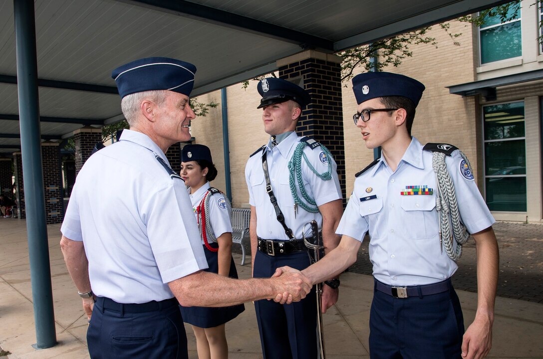 U.S. Air Force Lt. Gen. Darryl Roberson, commander Air Education and Training Command meets Junior Reserve Officer Training Corps cadets April 19 at John Jay High School in San Antonio, Texas. Roberson was inducted as an honorary Silver Eagle, making him the fourth person to receive the honorary title. (U.S. Air Force photo by Johnny Saldivar)