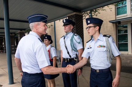 U.S. Air Force Lt. Gen. Darryl Roberson, commander Air Education and Training Command meets Junior Reserve Officer Training Corps cadets April 19 at John Jay High School in San Antonio, Texas. Roberson was inducted as an honorary Silver Eagle, making him the fourth person to receive the honorary title. (U.S. Air Force photo by Johnny Saldivar)