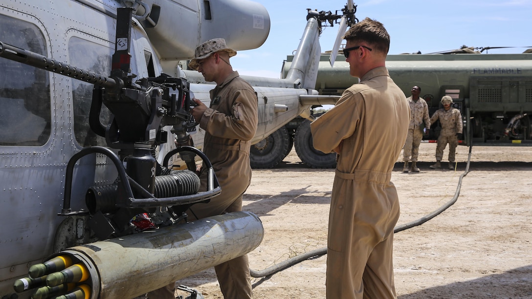 Marines with Marine Aviation and Weapons Tactics Squadron 1 refuel a UH-1Y Huey during forward arming refueling point operations as part of Assault Support Training 1 in support of the semiannual Weapons and Tactics Instructor Course 2-17, at the Chocolate Mountain Aerial Gunnery Range, California, April 17. Lasting seven weeks, WTI is a training evolution hosted by MAWTS-1 which provides standardized advanced and tactical training and certification of unit instructor qualifications to support Marine aviation training and readiness.