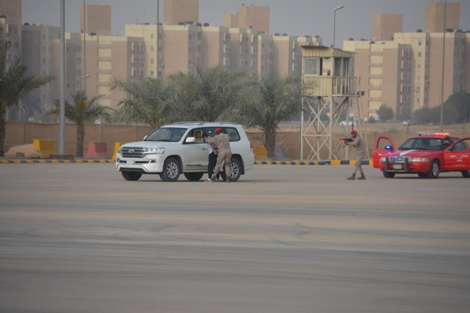 Members of the Saudi Arabia Ministry of Defense Military Police respond to a mock suspicious vehicle during a three-week training exercise with the 879th Expeditionary Security Forces Squadron at Eskan Village, Kingdom of Saudi Arabia March 26, 2017. Airmen and Saudi police members trained in multiple areas of security protection including: formations for escorting, identifying explosives and vehicle searches. (Courtesy photo)