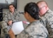 U.S. Air Force Tech. Sgt. Heather Mummery, 326th Training Squadron instructor, engages with Airmen during Airman’s Week activities Mar. 27 at Joint Base San Antonio-Lackland. The concept of Airmen’s Week stemmed from Air Force officials establishing a curriculum focused on wingmanship, resiliency, leadership and followership, sexual assault prevention and response, the warrior ethos, and how Airmen can balance their personal and professional lives. (U.S. Air Force photo by Johnny Saldivar) 