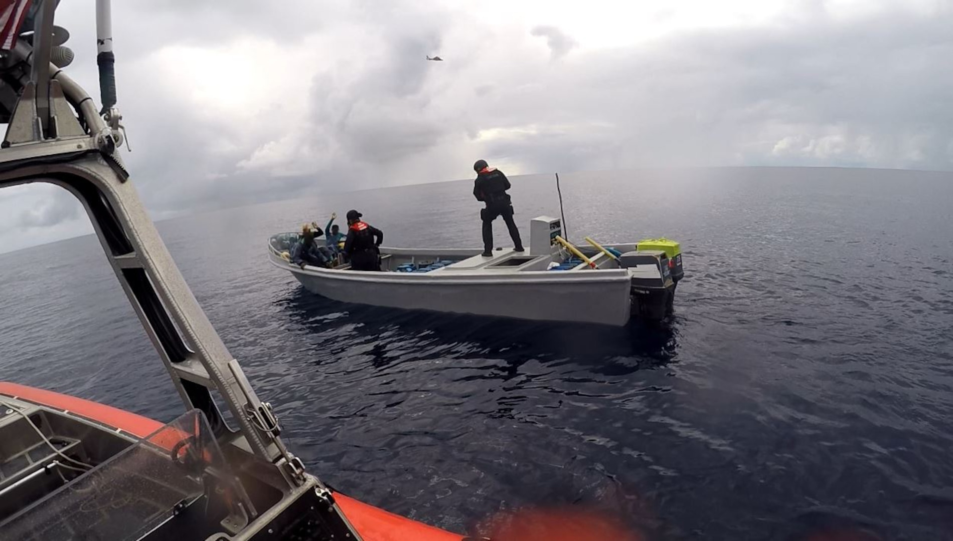 Boarding team members from the Coast Guard Cutter Mohawk interdict suspected smugglers in the Eastern Pacific in February, 2017. (US Coast Guard photo)