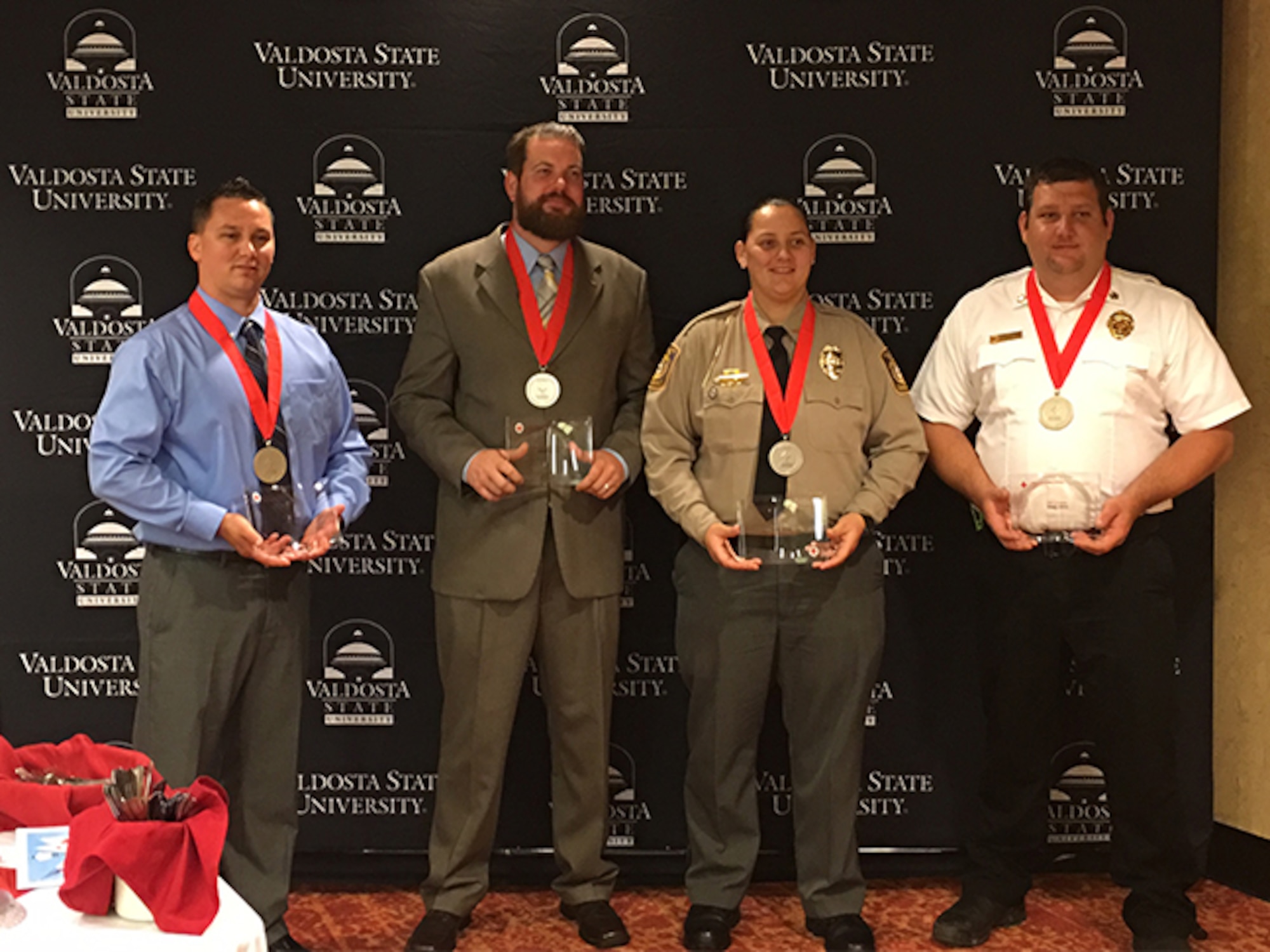 Staff Sgt. Joshua Dunn, 23d Component Maintenance Squadron aerospace propulsion craftsman, poses with fellow nominees during the American Red Cross of South Georgia Hero Awards, March 27, 2017, in Valdosta, Ga. Dunn was nominated for the Military Hero honors for safely removing passengers from a car accident until first responders arrived, Feb. 3, in Valdosta. (Courtesy photo)