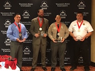 Staff Sgt. Joshua Dunn, 23d Component Maintenance Squadron aerospace propulsion craftsman, poses with fellow nominees during the American Red Cross of South Georgia Hero Awards, March 27, 2017, in Valdosta, Ga. Dunn was nominated for the Military Hero honors for safely removing passengers from a car accident until first responders arrived, Feb. 3, in Valdosta. (Courtesy photo)