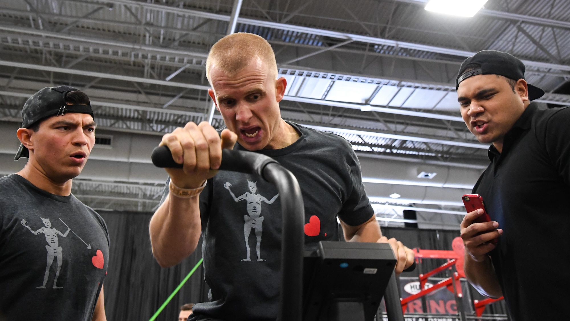 Andrew Cherry takes a turn in the bike assault bike relay during the ‘FitCon Frontline Throwdown’ at the Salt Palace in Salt Lake City, Utah, April 21. The relay lasted 10 minutes or until the four-member team burned 240 calories, which ever came first. (R. Nial Bradshaw/U.S. Air Force)
