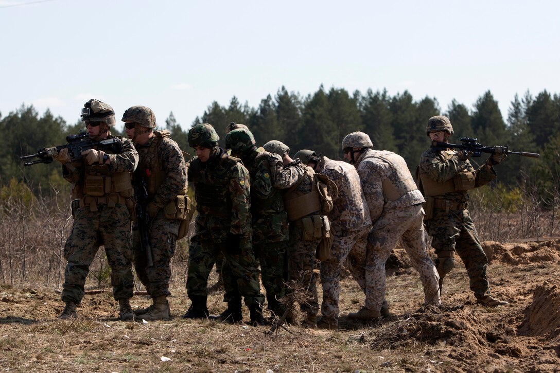 Marines and NATO partners participate in breach training during Exercise Summer Shield on Adazi Military Base, Latvia, April 20, 2017. Exercise Summer Shield is a multinational NATO exercise. Marine Corps photo by Sgt. Patricia A. Morris