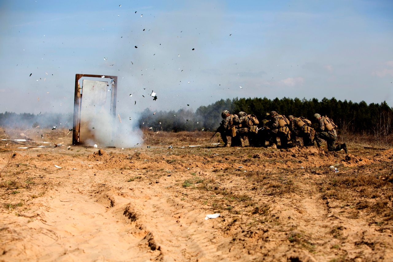 Marines and NATO partners participate in breach training during Exercise Summer Shield on Adazi Military Base, Latvia, April 20, 2017. Exercise Summer Shield is a multinational NATO exercise. The Marines are assigned to the Black Sea Rotational Force 17.1. Marine Corps photo by Sgt. Patricia A. Morris