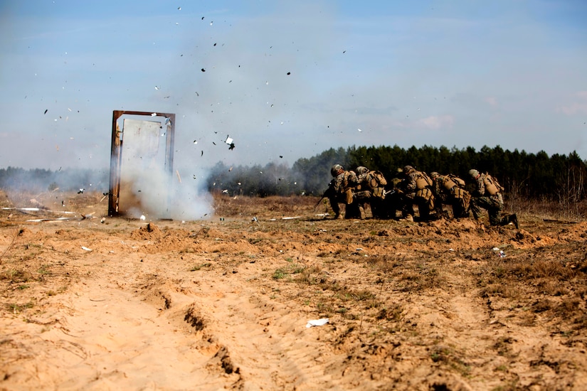 Marines and NATO partners participate in breach training during Exercise Summer Shield on Adazi Military Base, Latvia, April 20, 2017. Exercise Summer Shield is a multinational NATO exercise. The Marines are assigned to the Black Sea Rotational Force 17.1. Marine Corps photo by Sgt. Patricia A. Morris