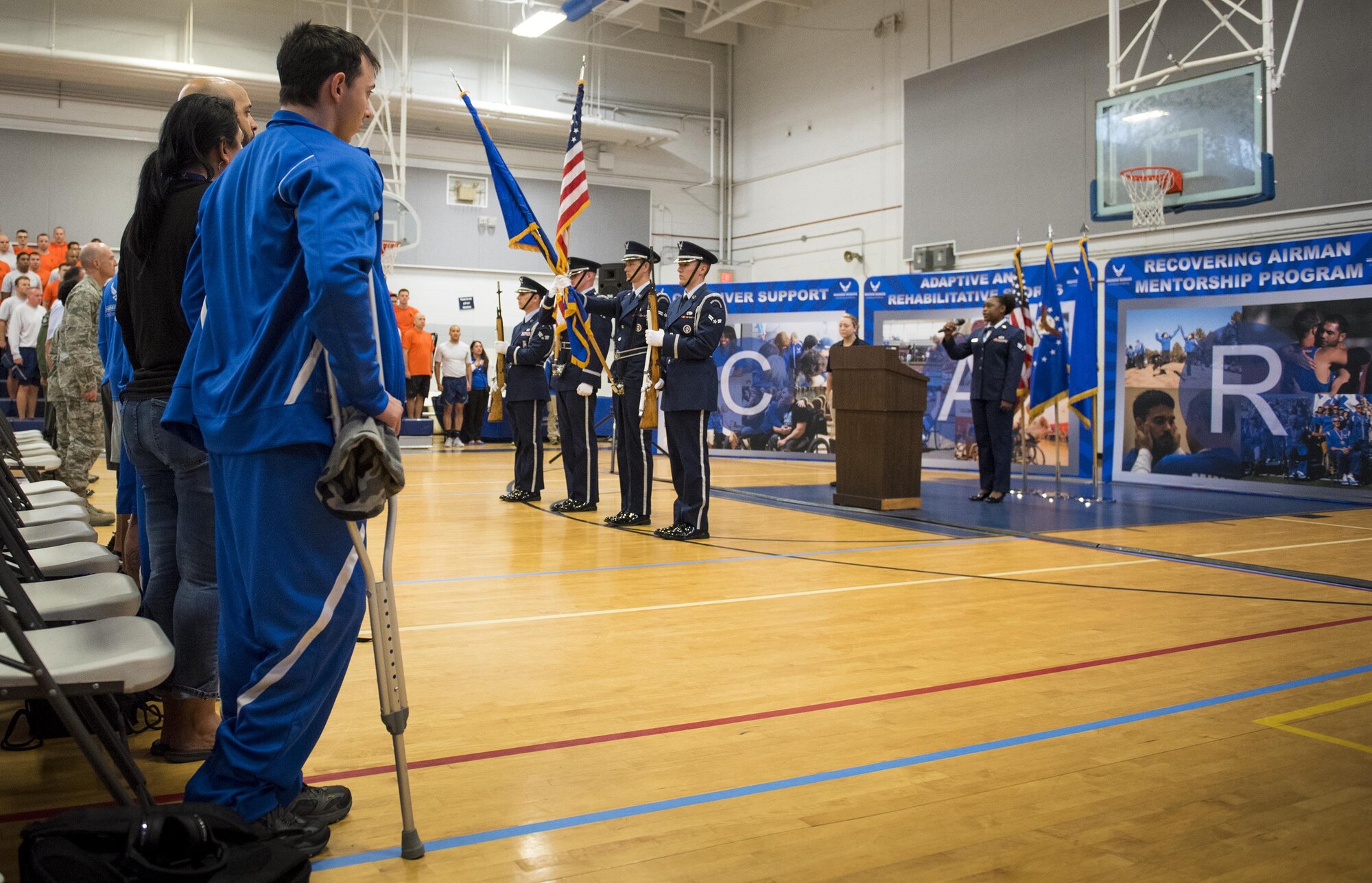 An Honor Guard team presents the colors during the opening ceremonies of this year’s Warrior Care/Games training event at Eglin Air Force Base, Fla., April 24.  The ceremony kicked off a week-long rehabilitative wounded warrior camp as well as a training session for the Air Force Warrior Games athletes. (U.S. Air Force photo/Samuel King Jr.)