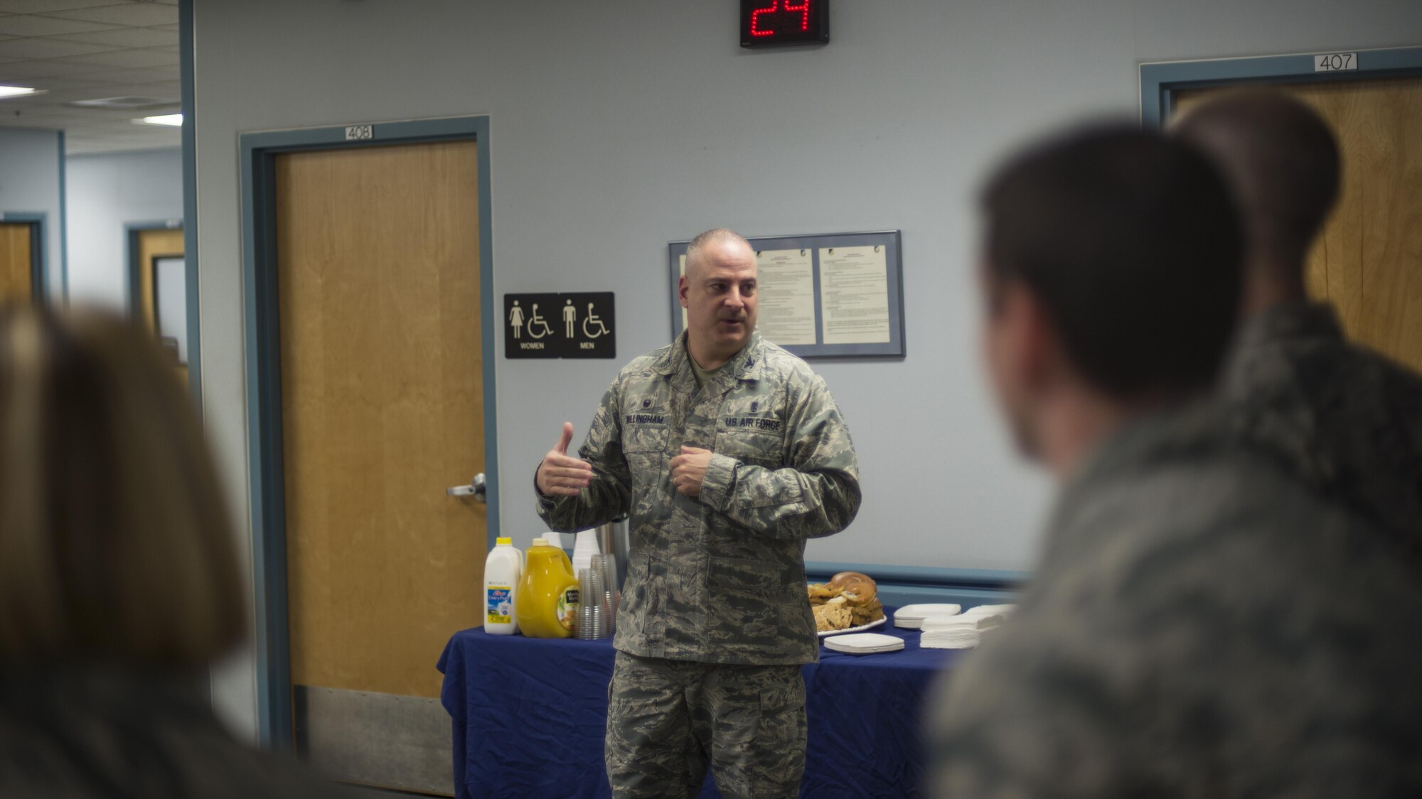 Col. Paul Willingham, the 49th Medical Group commander, addresses a room of people during the MDG's Swab-Thru event, at Holloman Air Force Base, N.M. on April 20, 2017. The Swab-Thru, coordinated with the “Salute to Life” program, is a special drive-thru bone marrow registration event. (U.S. Air Force photo by Airman 1st Class Alexis P. Docherty)