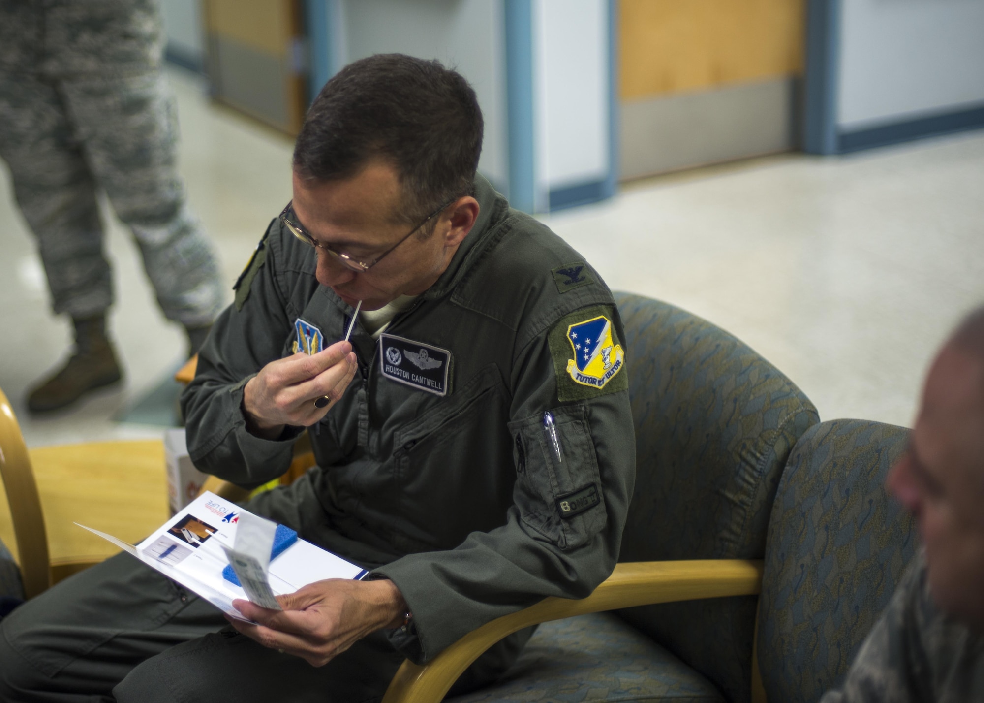 Col. Houston Cantwell, the 49th Wing commander, swabs the inside of his cheek while registering for the “Salute to Life” program during the 49th Medical Group’s Swab-Thru event, at Holloman Air Force Base, N.M. on April 20, 2017. The Swab-Thru, coordinated with the “Salute to Life” program, is a special drive-thru bone marrow registration event. Members who are interested in registering can stop by the Medical Group lab during duty hours. The MDG will continue to host registration drives throughout the year, but would like for other groups, squadrons and flights to get involved and host events. (U.S. Air Force photo by Airman 1st Class Alexis P. Docherty)