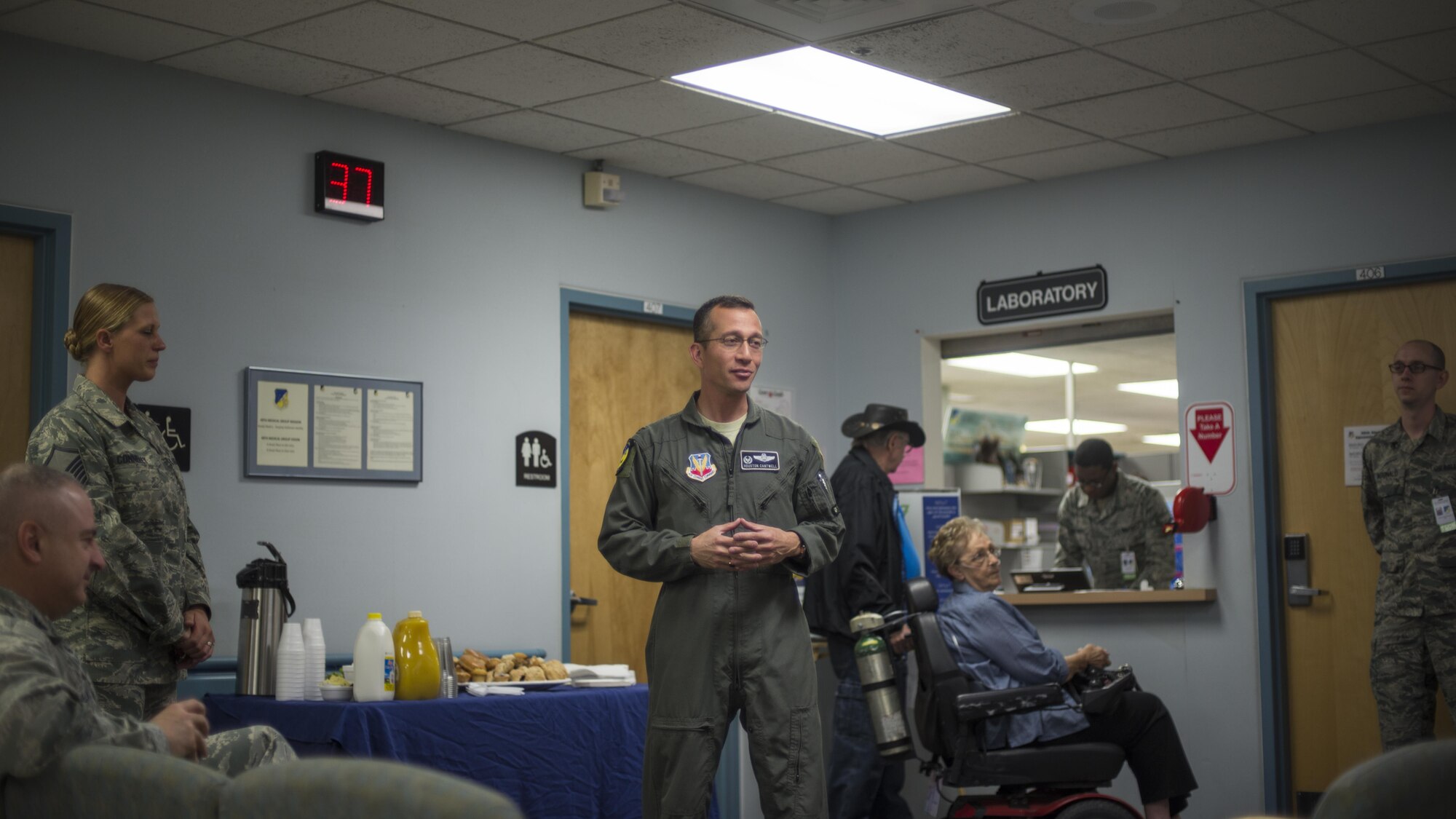 Col. Houston Cantwell, the 49th Wing commander, addresses a room of people during the 49th Medical Group’s Swab-Thru event, at Holloman Air Force Base, N.M. on April 20, 2017. The Swab-Thru, coordinated with the “Salute to Life” program, is a special drive-thru bone marrow registration event. “Salute to Life” works solely with military personnel, their dependents, civilians and contract employees, Reservists, Coast Guard and National Guard members, to facilitate bone marrow and stem cell donations. (U.S. Air Force photo by Airman 1st Class Alexis P. Docherty)