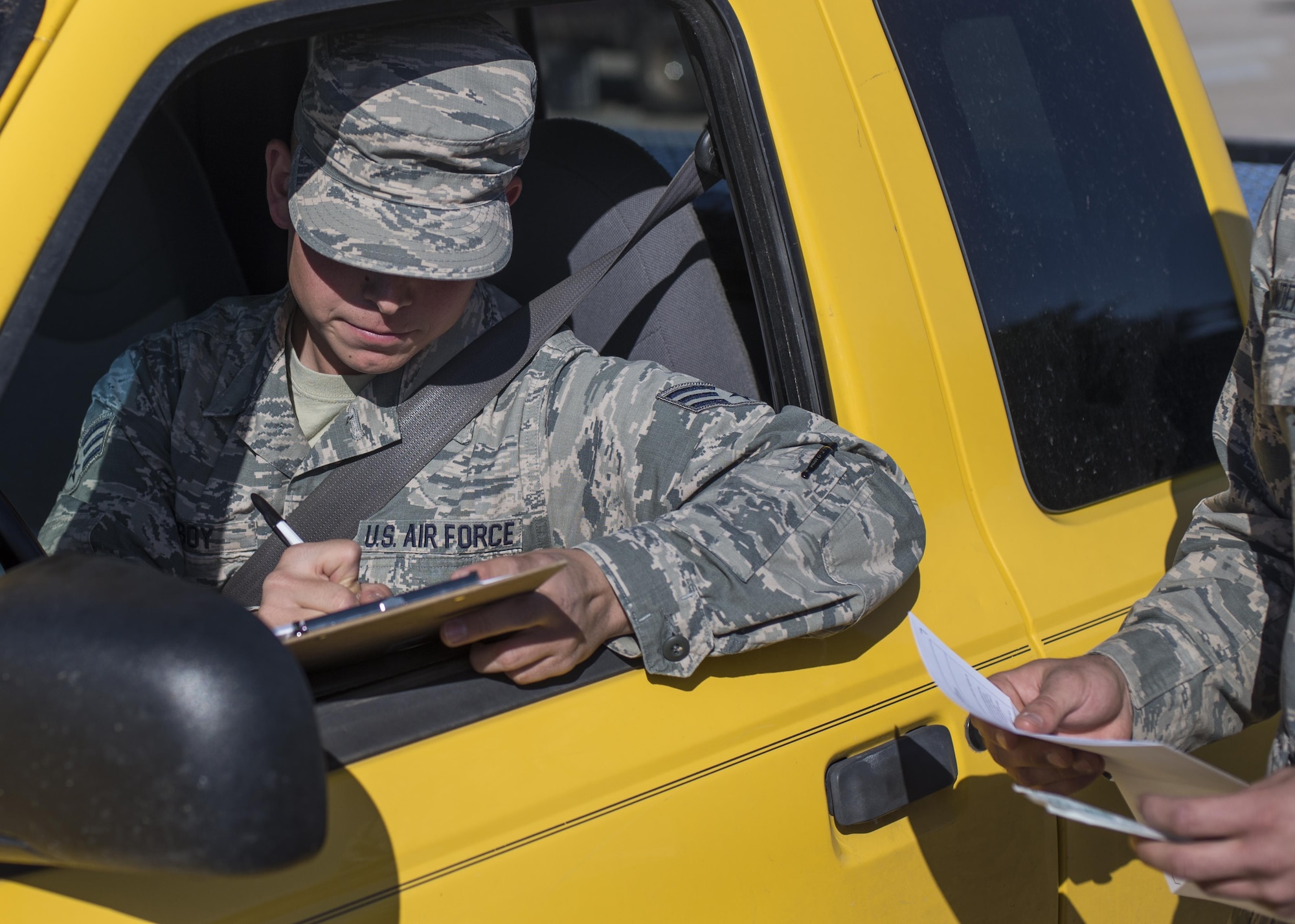 Senior Airman Bryce Bigboy, a 49th Material Maintenance Squadron metals technician, fills out a consent form during the 49th Medical Group’s Swab-Thru event, at Holloman Air Force Base, N.M. on April 20, 2017.  The Swab-Thru, coordinated with the “Salute to Life” program, is a special drive-thru bone marrow registration event. (U.S. Air Force photo by Airman 1st Class Alexis P. Docherty)