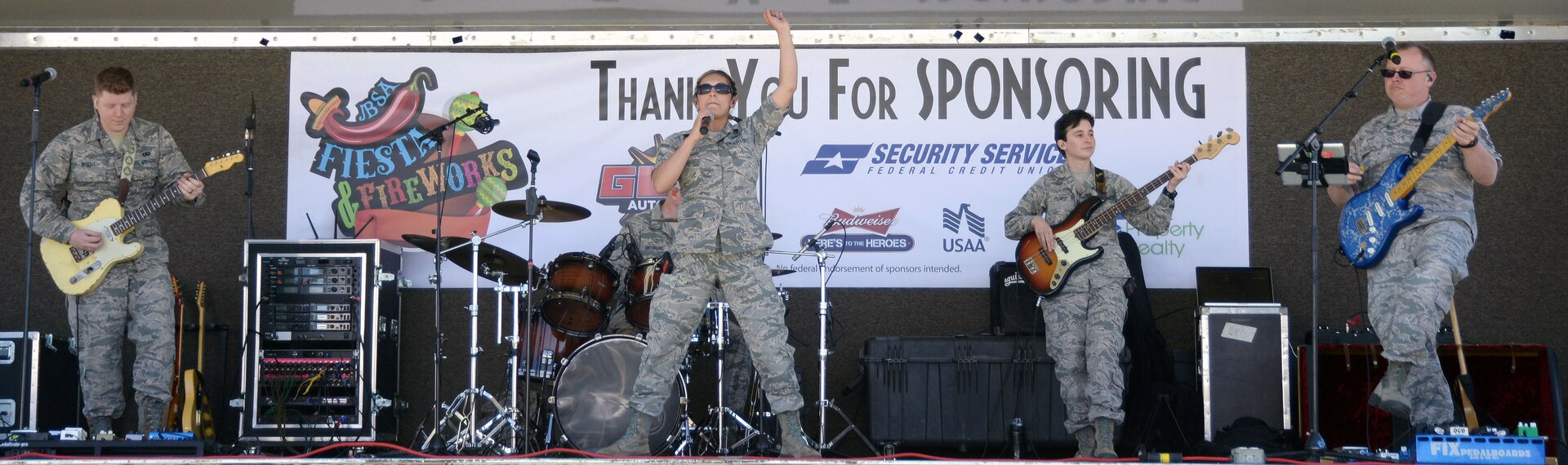 Members of the U.S. Air Force band of the West get their groove on for the crowd at the Fiesta and Fireworks event at Joint Base San Antonio-Fort Sam Houston April 23.