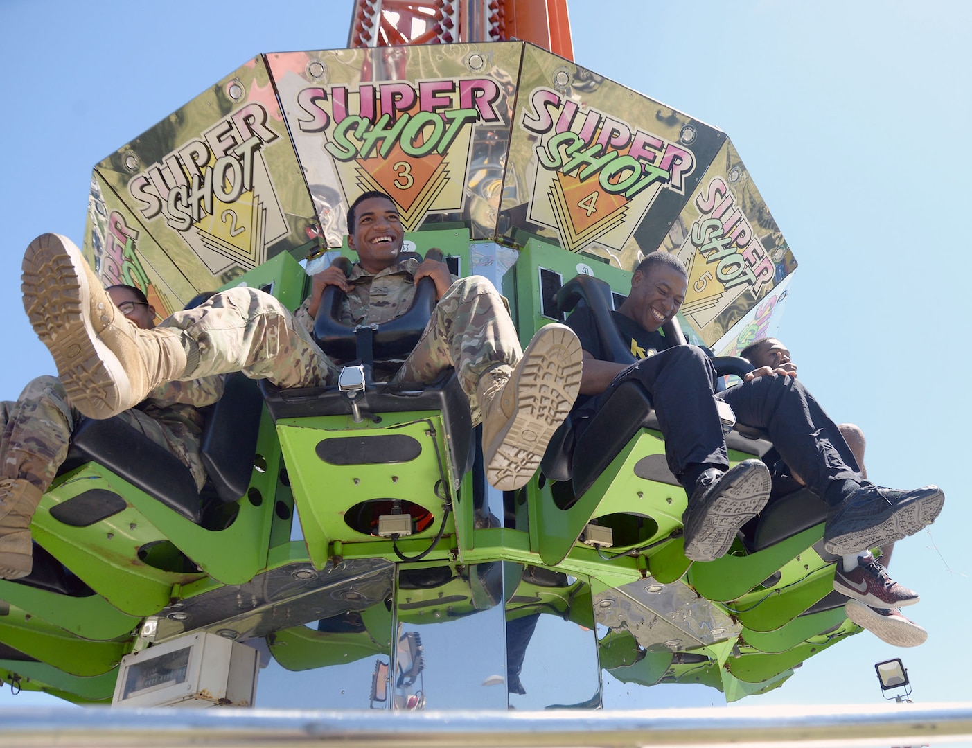 A few service people get vertical on a ride during the Fiesta and Fireworks event at Joint Base San Antonio-Fort Sam Houston April 23.