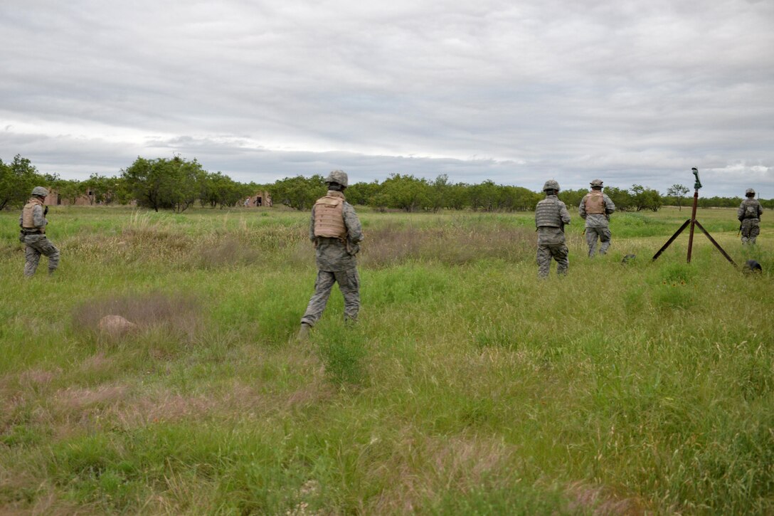 Angelo State University Air Force ROTC Detachment 847 Cadets patrol a field during a field training exercise at Camp Sentinel on Goodfellow Air Force Base, Texas, April 22, 2017. The FTX is designed to give cadets a broader understanding of what the Air Force is truly like before committing to serve. (U.S. Air Force photo by Airman 1st Class Randall Moose/Released)