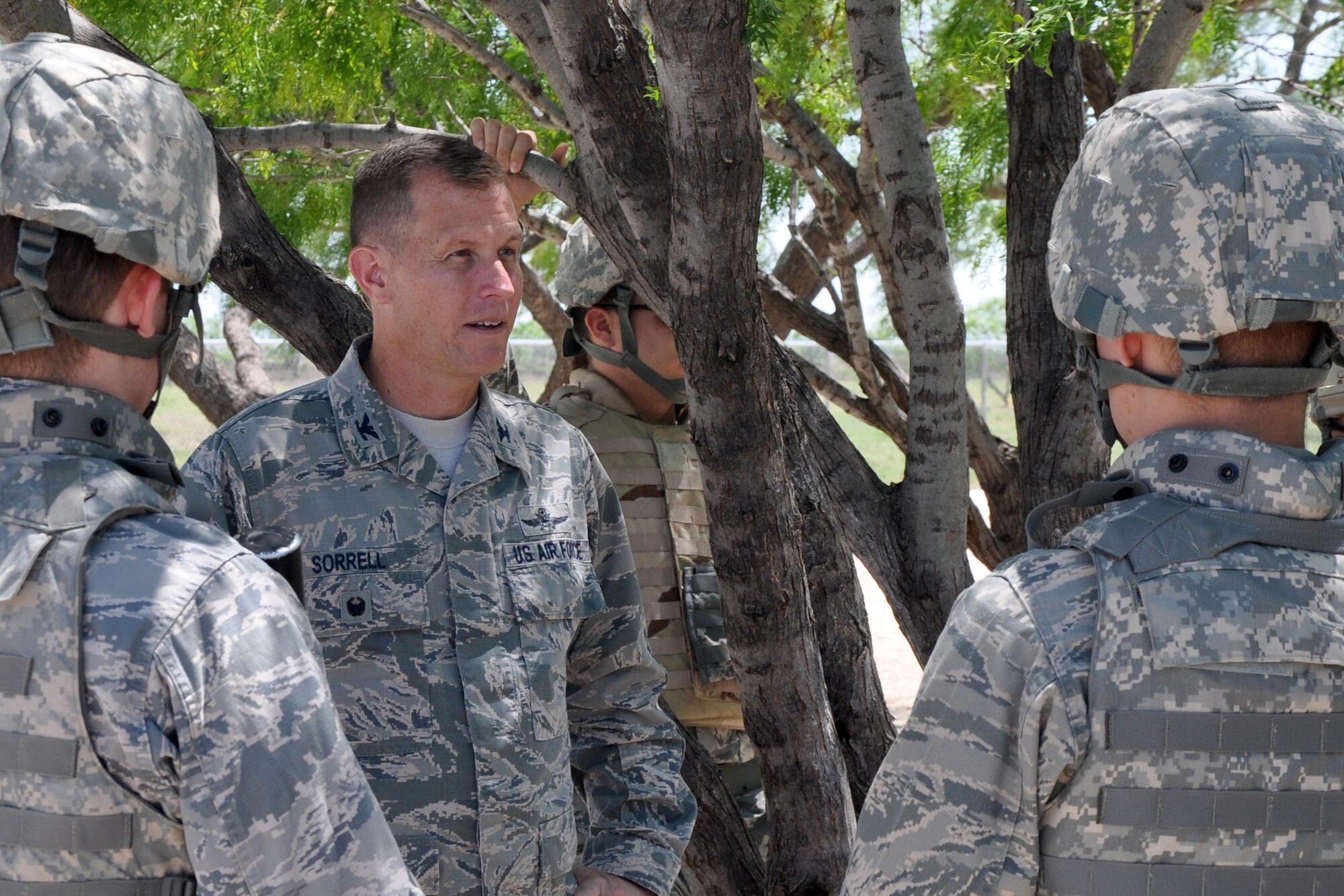 U.S. Air Force Col. Jeffrey Sorrell, 17th Training Wing Vice Commander, visits Angelo State University Air Force ROTC Detachment 847 cadets during a field training exercise at Camp Sentinel on Goodfellow Air Force Base, Texas, April 21, 2017. The FTX lasted more than 24 hours and tested the cadet’s leadership capabilities. (U.S. Air Force photo by Christopher Hernandez/Released)