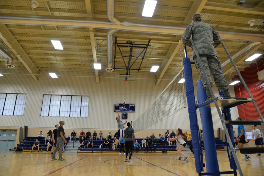 Teams compete during a volleyball game at the base fitness center during sports day April 21, 2017, at Malmstrom Air Force Base, Mont. Throughout the day, teams were awarded points depending on how they placed in each sporting event. (U.S. Air Force photo/Airman 1st Class Daniel Brosam)