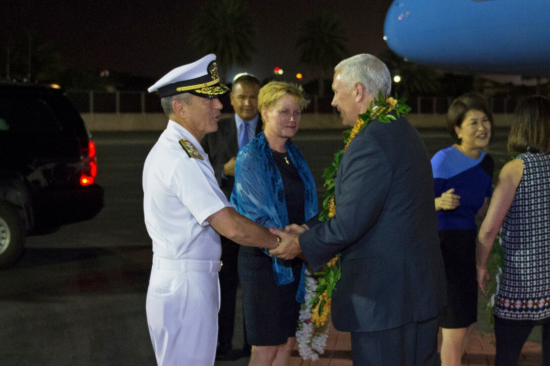 Navy Adm. Harry B. Harris Jr., commander, U.S. Pacific Command, greets Vice President Mike Pence on his arrival at Hickam Airfield, Joint Base Pearl Harbor-Hickam, Hawaii, April 23, 2017. Pence’s stop in Hawaii caps off his first official visit to the Indo-Asia-Pacific region reinforcing the United States' full commitment to its security alliances. Navy photo by Petty Officer 2nd Class Robin W. Peak