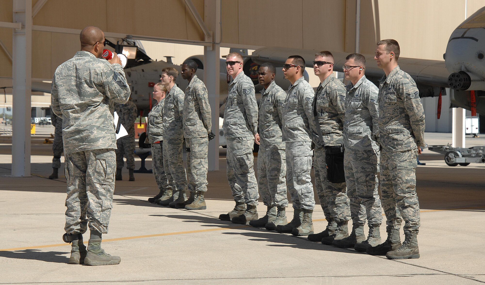 U.S. Air Force Chief Master Sgt. Theodis Bell, 355th Maintenance Group weapons manager, addresses three weapons teams before a load crew of the quarter competition at Davis-Monthan Air Force Base, Ariz., April 21, 2017. The three competing teams were the 354th, 357th and the 924th aircraft maintenance units. (U.S. Air Force photo by Airman 1st Class Frankie D. Moore)