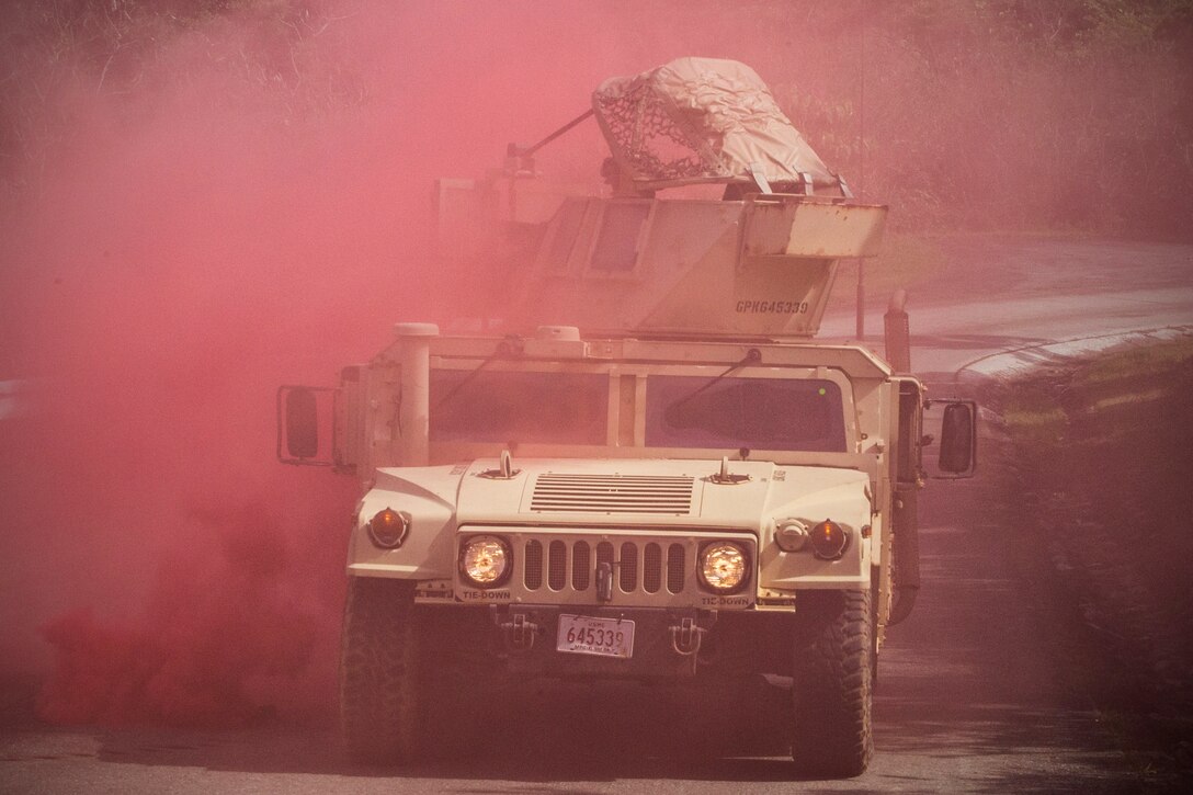 Marines train for chemical attacks at Central Training Area, Camp Hansen, April 18, 2017. The battalion conducted a Marine Corps Combat Readiness Evaluation to test each company’s ability to execute tasks ranging from policing operations to police patrolling, route regulations, key leader engagements in towns and local population centers, security of key infrastructure, identity operations and law enforcement operations in an expeditionary environment, to ensure they are prepared to support the operational requirements of III Marine Expeditionary Force. The Marines are with Charlie Company, 3d LE Bn., III Marine Expeditionary Force Headquarters Group, III MEF. (U.S. Marine Corps photo by Lance Cpl. Joshua Pinkney)
