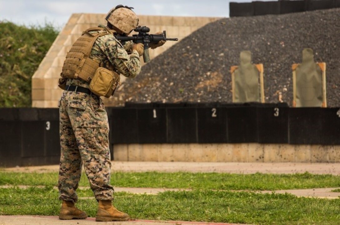 MARINE CORPS BASE HAWAII – Sgt. James Martin, a training noncommissioned officer with Headquarters Battalion, demonstrates Table Five as part of the unit’s annual training qualification at Kaneohe Bay Range Training Facility aboard MCB Hawaii on March 15, 2017. Headquarters Bn. is conducting the training in order to meet the Marine Corps’ requirement that every unit must complete Tables Three through Six to better prepare Marines for combat. (U.S. Marine Corps photo by Lance Cpl. Isabelo Tabanguil)