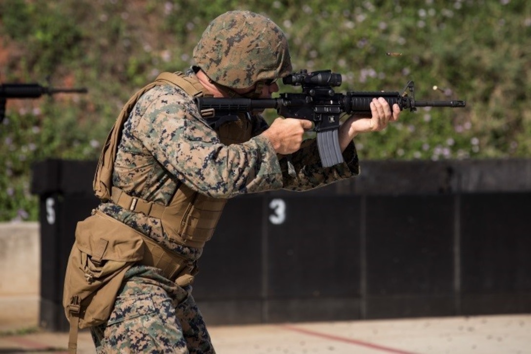 MARINE CORPS BASE HAWAII – A Marine with Headquarters Battalion fires off rounds during the unit’s annual training qualification for Table Five at Kaneohe Bay Range Training Facility aboard MCB Hawaii on March 15, 2017. Headquarters Bn. is conducting the training in order to meet the Marine Corps’ requirement that every unit must complete Tables Three through Six to better prepare Marines for combat. (U.S. Marine Corps photo by Lance Cpl. Isabelo Tabanguil)