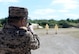 A Mongolian Air Force service member aims a M9 Beretta during the firing portion of Pacific Defender 17-1, April 11, 2017, at Andersen Air Force Base, Guam. Pacific Defender, is designed to establish integrated defensive cooperation with Indo-Asia-Pacific nations, while promoting regional stability and military relations. (U.S Air Force photo by Airman 1st Class Gerald R. Willis/Released)