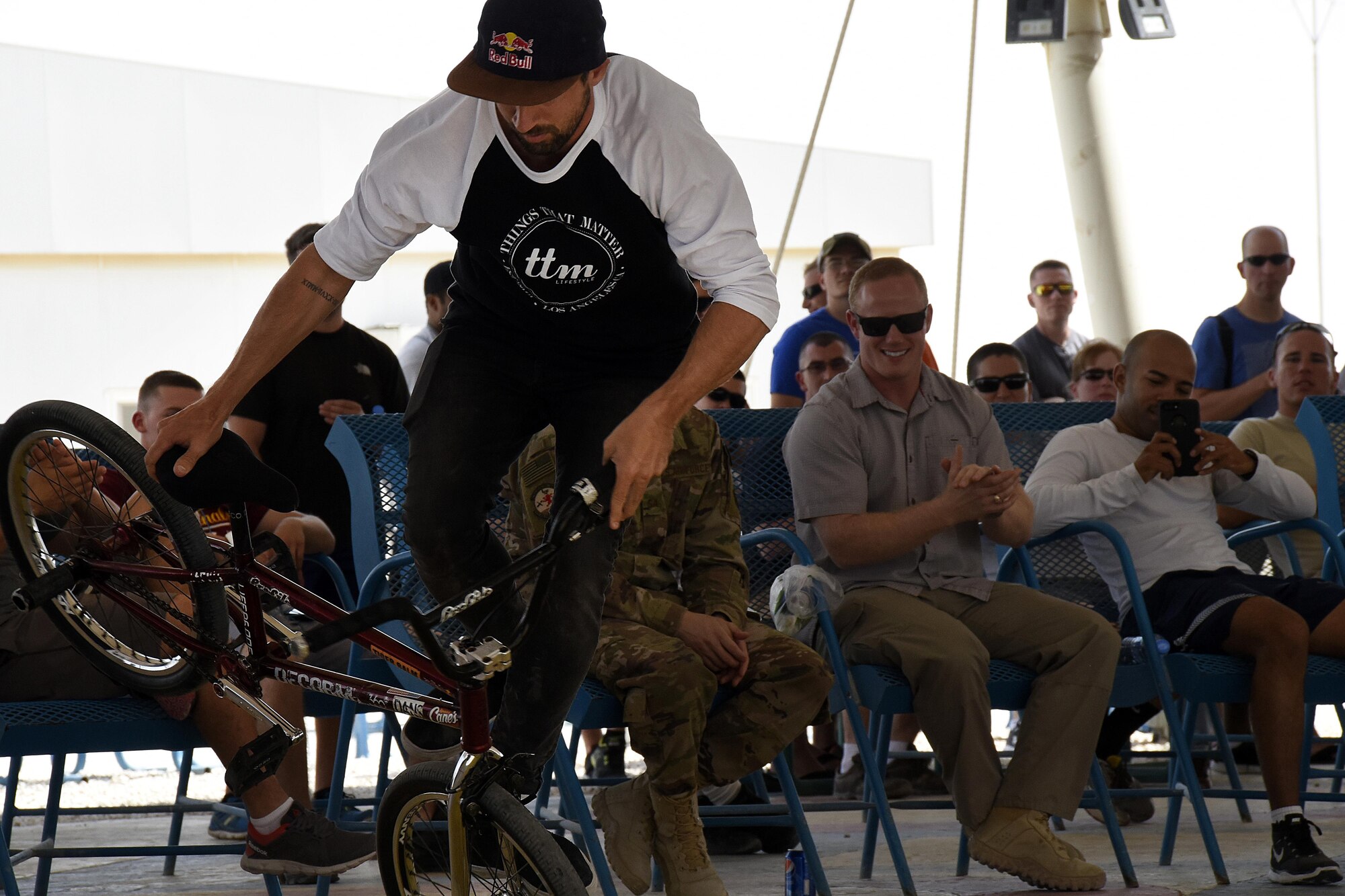 Terry Adams, a Bikes Over Baghdad BMX rider, preforms a trick at Al Udeid Air Base, Qatar, April 20, 2017. Bikes Over Baghdad is a professional team of BMX Riders who travel throughout the U.S. Central Command area of responsibility putting on shows for service members. (U.S. Air Force photo by Senior Airman Cynthia A Innocenti)
