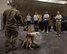 U.S. Army Spc. Ian Orourke, left, 195th Medical Detachment Veterinary Support Services, gives a class at Al Udeid Air Base, Qatar, April 19, 2017. Bisset attended the class in order to gain a better understanding of a military working dog anatomy so they can help in the event that no veterinary medical staff is available. (U.S. Air Force photo by Tech. Sgt. Amy M. Lovgren)