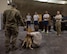 U.S. Army Spc. Ian Orourke, left, 195th Medical Detachment Veterinary Support Services, gives a class at Al Udeid Air Base, Qatar, April 19, 2017. Bisset attended the class in order to gain a better understanding of a military working dog anatomy so they can help in the event that no veterinary medical staff is available. (U.S. Air Force photo by Tech. Sgt. Amy M. Lovgren)