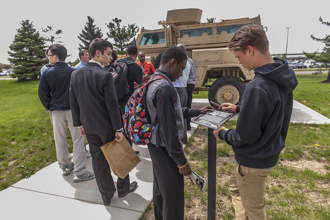 High school students tour Mission Park for a hands on opportunity to see the types of military equipment DLA purchases to support warfighters around the world during a site visit on Apr. 20.