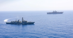 The Royal Navy frigate HMS Monmoth steams alongside the amphibious assault ship USS Bataan (LHD 5) while conducting small boat operations during exercise Alligator Dagger 17 in the vicinity of Djibouti.  The exercise provides an opportunity to enhance multilateral capabilities in critical mission sets inherent to the U.S. Navy-Marine Corps, as well as partners and allies in the region. Bataan and its ready group, are deployed to the U.S. 5th Fleet area of operations in support of maritime security operations designed to reassure allies and partners, and preserve the freedom of navigation and the free flow of commerce in the region. 